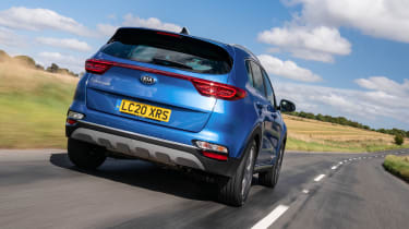 Kia Sportage Mk4 — вид сзади в движении