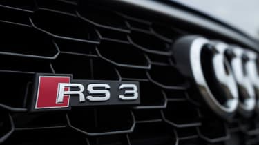 Эмблема Audi RS 3