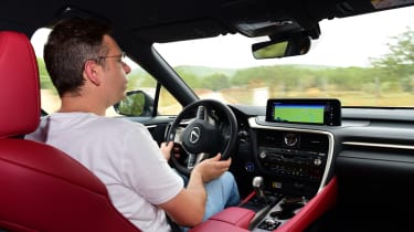 Lexus RX 450h F Sport в движении