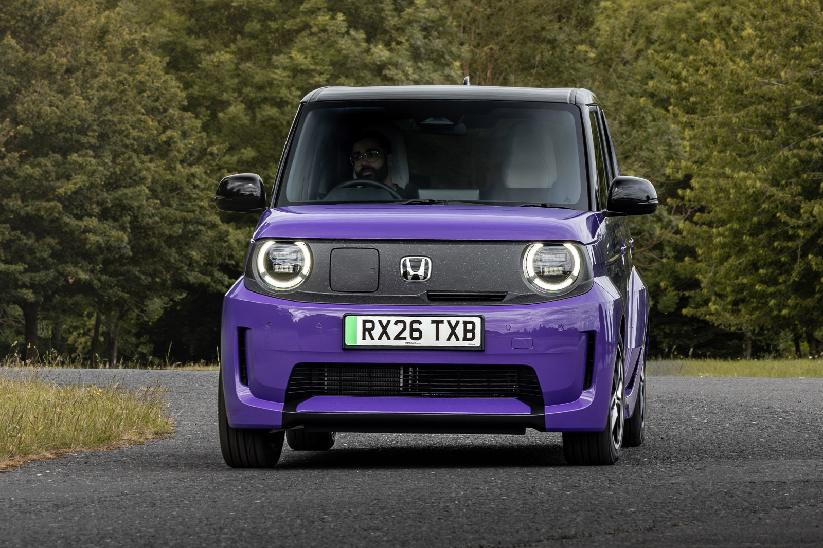 Honda Super-N на извилистой дороге